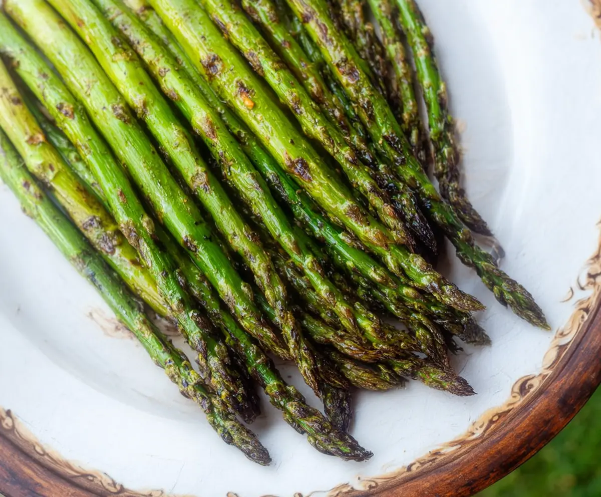 Delicious grilled asparagus seasoned with fragrant Garam Masala for a flavorful healthy appetizer.